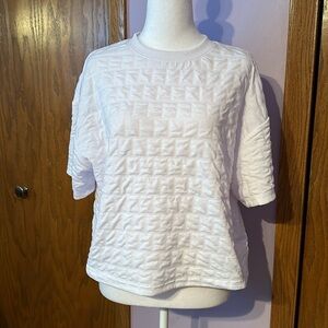 A set of two A New Day women’s size medium white and black short sleeved shirts.